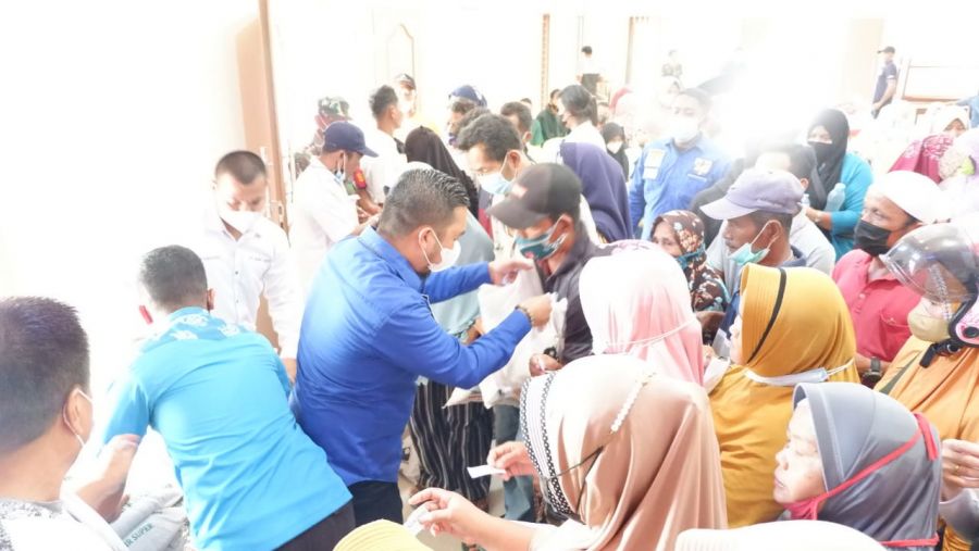 DPD KNPI Bersama BPC HIPMI Labura Gelar Vaksinasi dan Beri 200 Sembako Peserta Vaksinasi